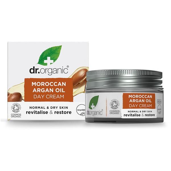 Creme de dia de óleo de argão biológico Dr. Organic, 50 ml, em boião branco com tampa e embalagem de cartão.
