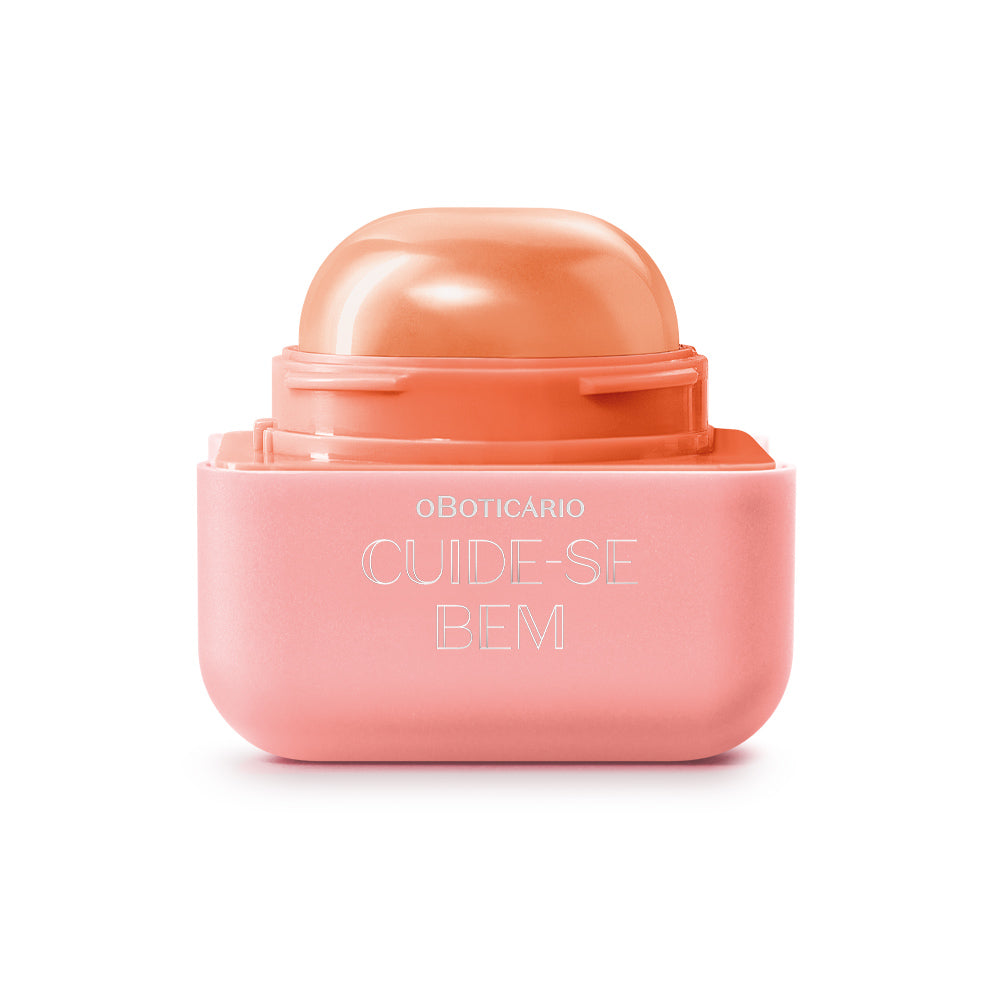 Hidratante Labial Pessegura – 6,2g – Cuide-se Bem – oBoticário, embalagem rosa com tampa coral e fórmula cremosa que hidrata e colore os lábios em tom coral suave.