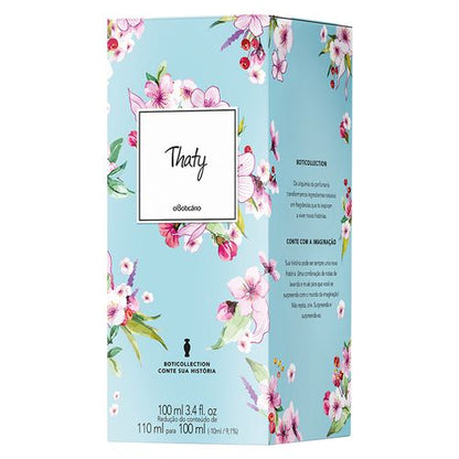 Embalagem perfume Thaty oBoticário caixa floral azul com design delicado