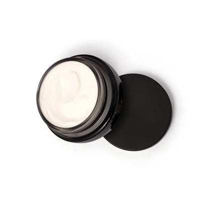 Creme Her Code aberto com tampa ao lado e textura visível