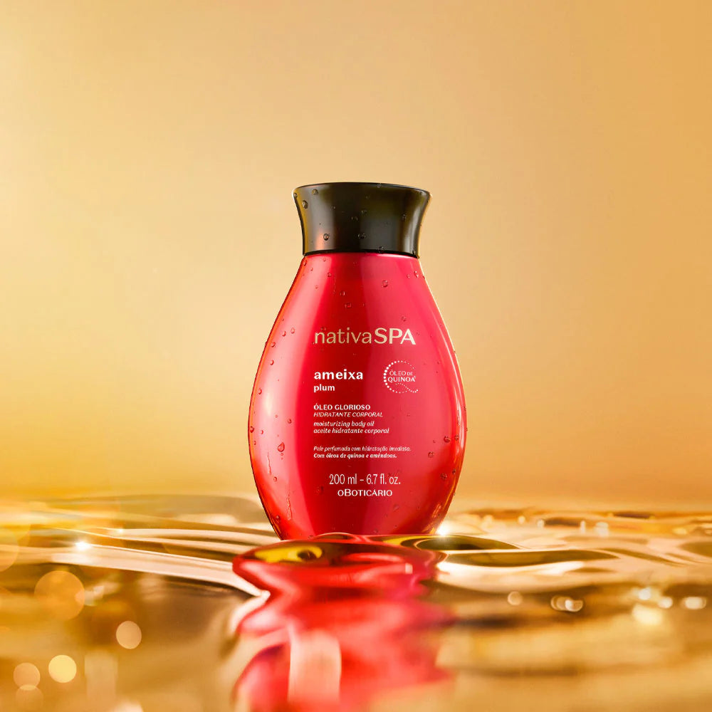Óleo Glorioso de Banho Nativa SPA Ameixa 200ml com óleo de quinoa e amêndoas sobre superfície dourada.