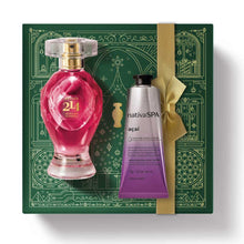 Kit de Natal oBoticário Botica 214 African Sunrise + Açaí — caixa verde com laço dourado, perfume rosa e creme de mãos lilás, presente feminino vibrante e elegante.