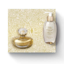 Kit de Natal oBoticário Lily — caixa dourada ilustrada, perfume Lily dourado e sabonete líquido acetinado, presente feminino elegante e floral.