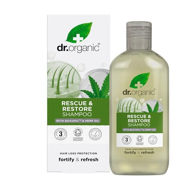 Champô Reparador Óleo de Cânhamo Bio, em frasco branco de 265 ml com tampa prateada, apresentado ao lado da respetiva caixa com folhas de cânhamo.