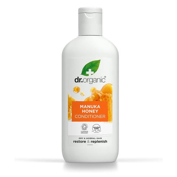 Frasco branco translúcido de 265 ml de Amaciador Mel de Manuka Bio Dr. Organic, com tampa transparente e rótulo laranja com imagem de favos de mel.