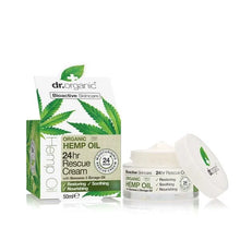 Creme hidratante facial 24h com óleo de cânhamo biológico, em boião branco de 50 ml aberto, ao lado da embalagem verde e branca.
