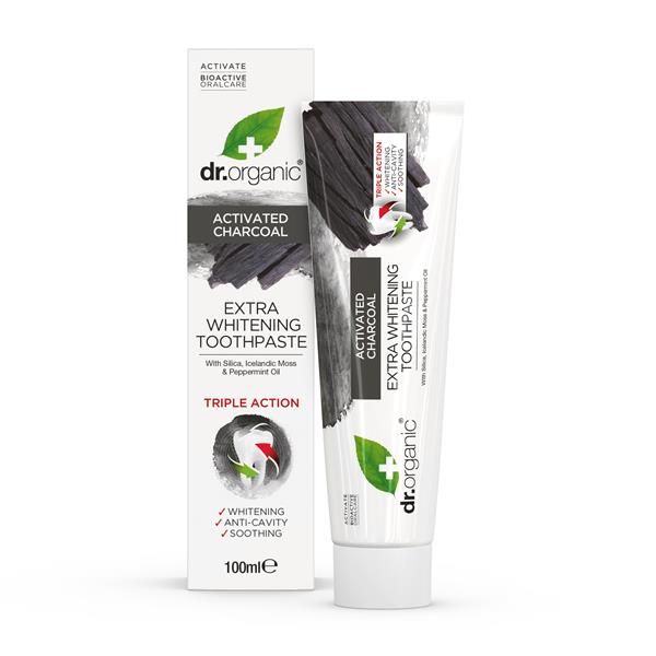 Pasta de dentes branqueadora Dr. Organic com carvão ativado, em bisnaga branca de 100 ml, apresentada ao lado da respetiva caixa branca com grafismo preto de carvão.