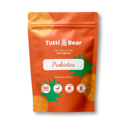 Embalagem laranja em formato de bolsa resselável de Gomas Probióticas TuttiBear, sabor a ananás, com 60 gomas, vegan, sem açúcar e sem glúten.