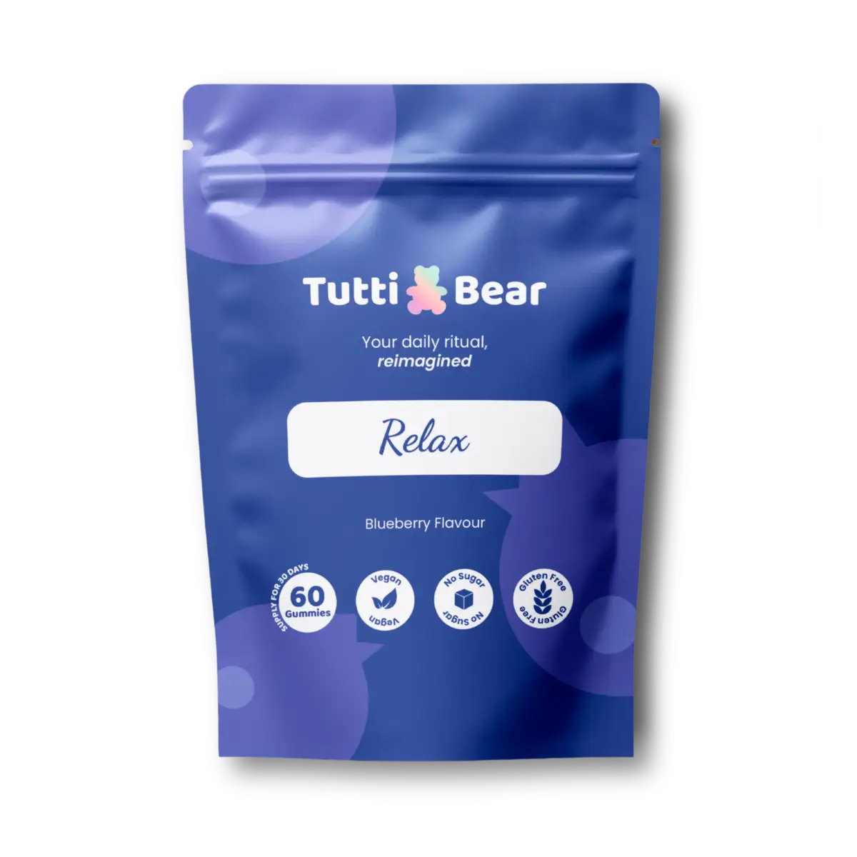 Embalagem azul de Tutti Bear Relax, suplemento alimentar em 60 gomas vegan com sabor a mirtilo.