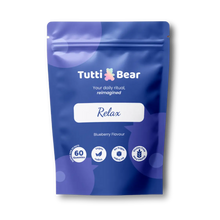 Embalagem azul de Tutti Bear Relax, suplemento alimentar em 60 gomas vegan com sabor a mirtilo.
