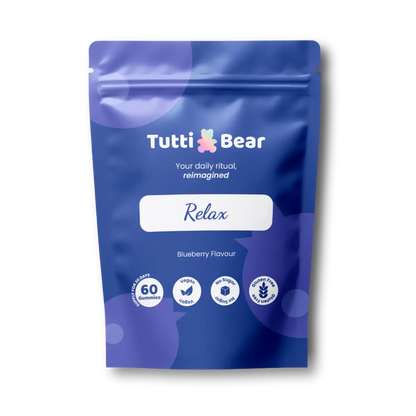 Embalagem azul de Tutti Bear Relax, suplemento alimentar em 60 gomas vegan com sabor a mirtilo.