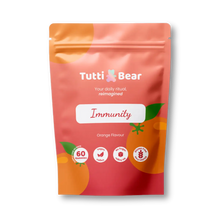 Embalagem flexível rosa e laranja de Gomas de Imunidade TuttiBear, sabor a laranja, com 60 gomas veganas.